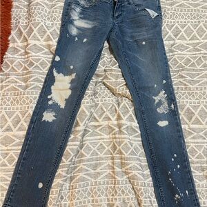 Distressed Blue Jeans